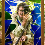 Saxon Holt, reflections in a garden – self-portait cracked mirror